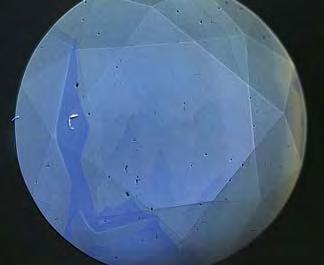 history, of most natural diamonds. Neither the fluorescence nor the growth features that are characteristic of synthetic diamonds (see, e.g., Wang et al.