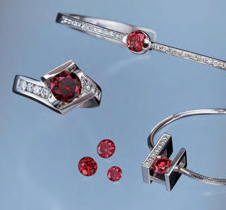 Figure 1. Treated-color Imperial Red Diamonds are being produced by Lucent Diamonds of Denver, Colorado. Shown here are three loose stones (0.15 0.