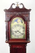 Realised 1700 464 Scottish mahogany long cased clock, swan neck pediment blind fret work with spiral supports, brass and silvered  Realised 1500 Lot 459 Lot 464 Thomas R