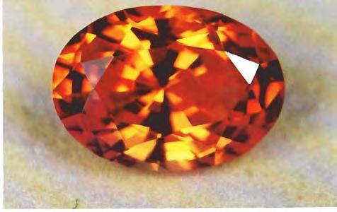 Figure 3. A synthetic sapphire marketed by Kyocera International, Inc., in Kyoto, lapan, as "lnamori grown padparadscha." This stone weighs 1.05 ct. Photo by Tino Hammid. Figure 5.