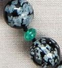52 Snowflake Obsidian Emerald & Locates pools of negative energies in your body and aura and then releases them.