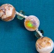33 Mother Opal Helps you resolve issues with mother, motherhood, and birth; increases your access to inner knowledge.