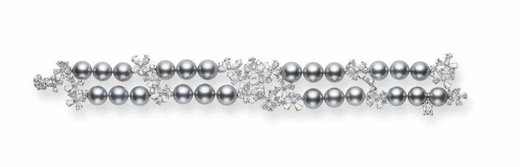 fr Important Bracelet with black South Sea grey pearls (4 pieces at 9 x 9.