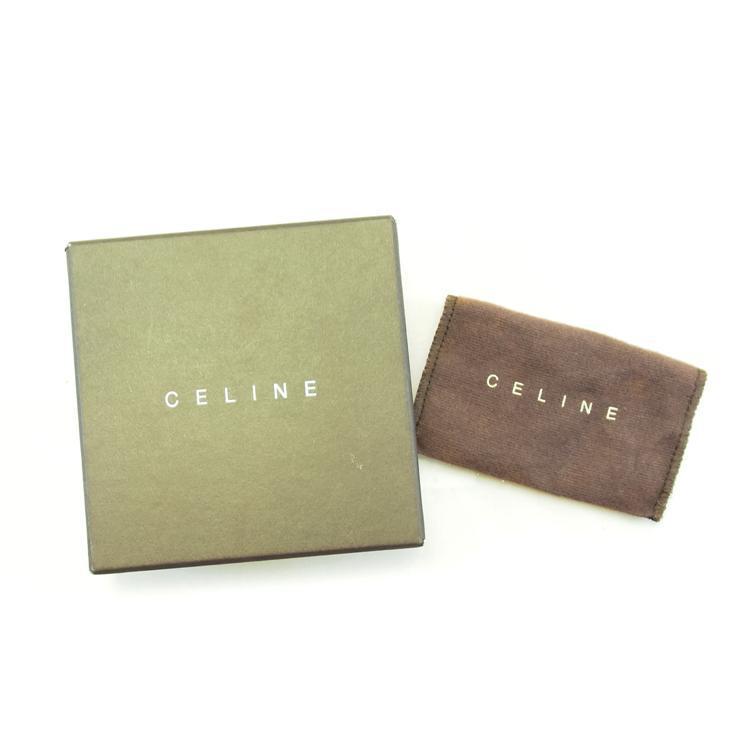 Céline (continued) Figure 12: Original Céline box and felt wallet which