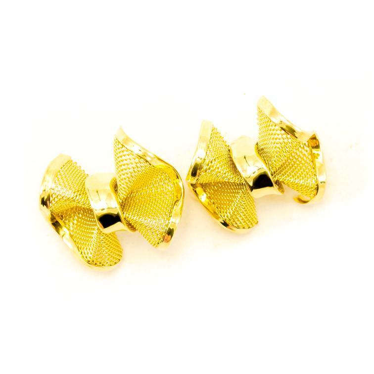 Givenchy (continued) Figure 5: Givenchy Goldtone Mesh Bow
