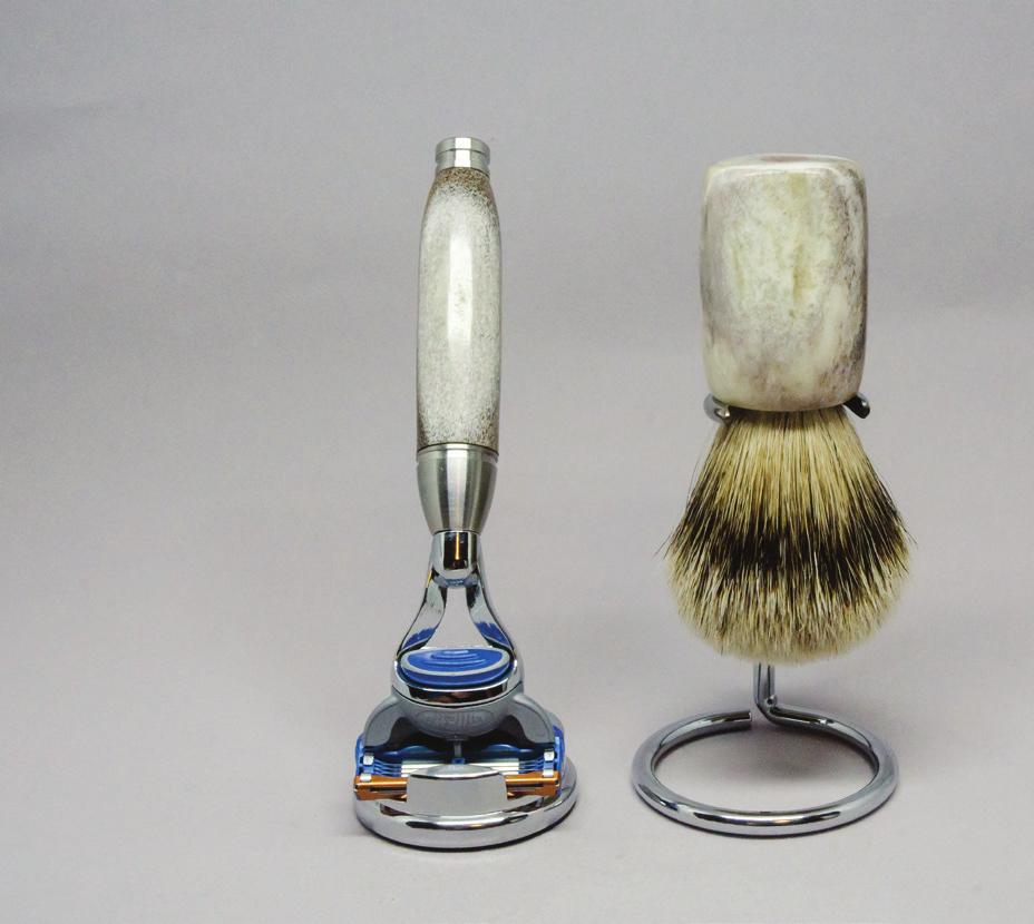 Brush: Elk antler from southern Alberta, silvertip badger for the CREATOR The world flows through all of us, both soulful and haunting like the call of the elk.