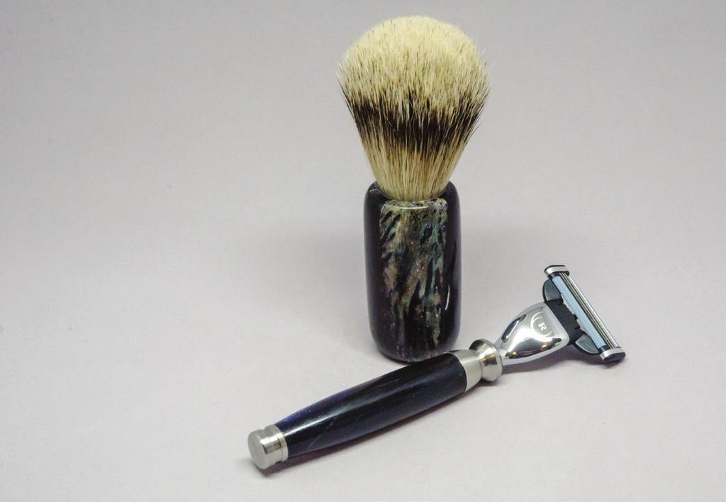 Brush: Northern Alberta buffalo horn and resin mixed media, silvertip badger hair knot.