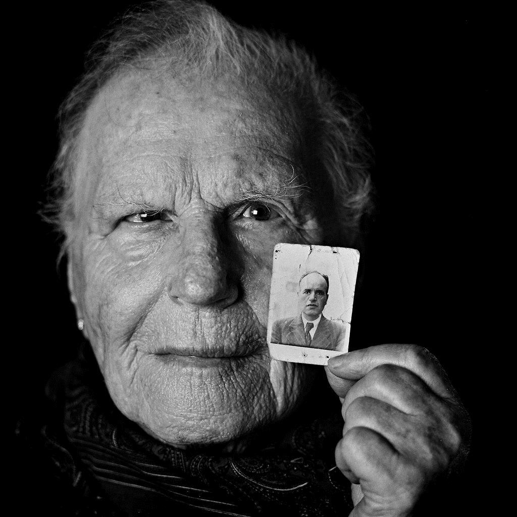 Alegra Shami, 84, with the only photo she has of her father. She was 16 when she arrived at Auschwitz.