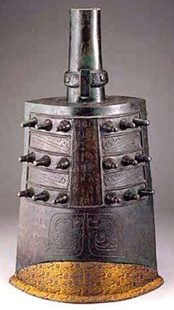 In the Shang dynasty, bells were supported on a long pole and sounded by striking them on the outside rim with a wooden mallet (they didn t have clappers inside).