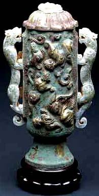 Figure 33 Jade dragon cast in bronze with (10 petal) flower lid.