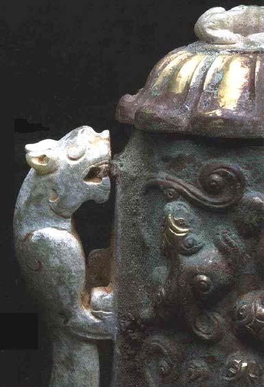 Figure 38 Jade dragon artifact with clay