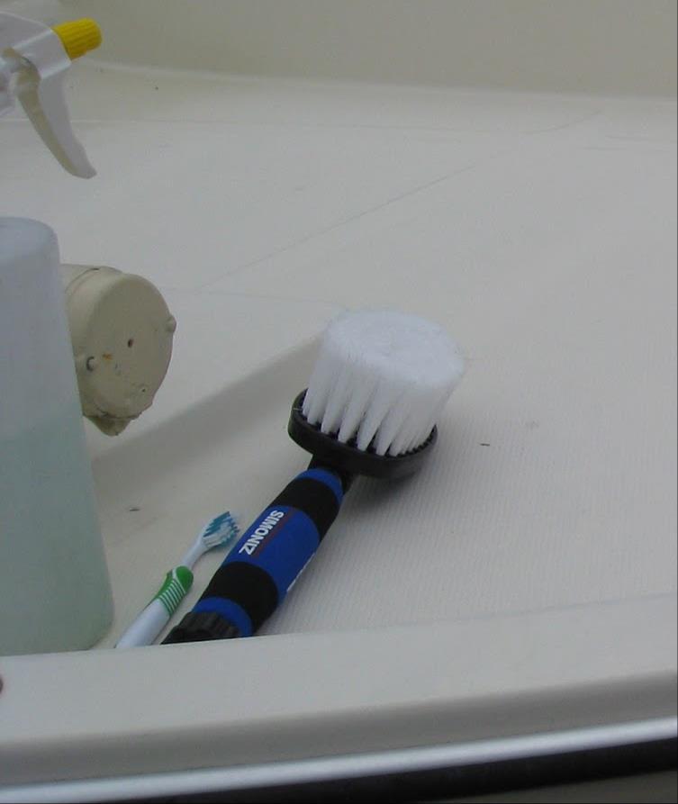 How to clean: Use a boat soap or specialist cleaner to scrub down the whole boat Use a soft brush and a toothbrush for tight corners, around fittings, into corners and in seams and joints.