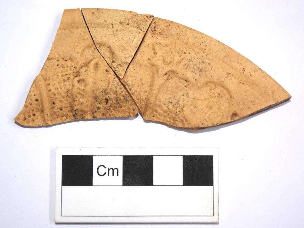 Fig 21 Trench B2, 05, piece of moulded plate of probable 17