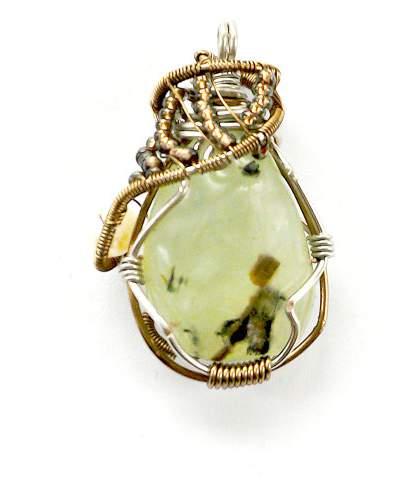 on transluscent prehnite with freshwater pearl