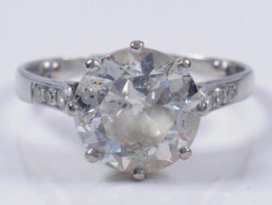 319 A diamond mounted single stone ring with round old brilliant cut diamond approximately 9.8mm x 5.