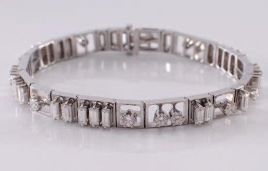 342 A diamond mounted bracelet of square and rectangular links, claw-set with brilliant and