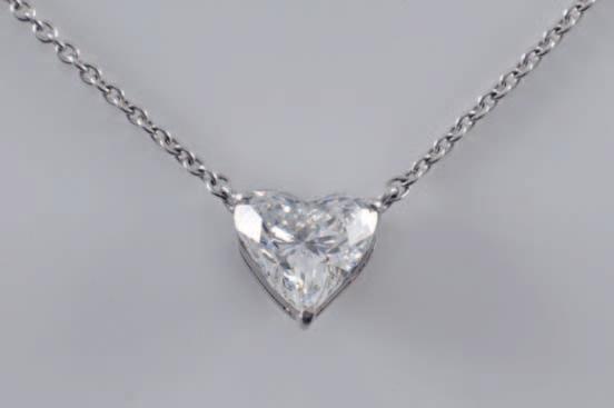 72 343 A heart-shaped diamond single-stone pendant approximately 7.5mm long x 8.