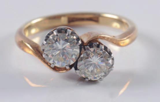 diamond mounted two-colour crossover ring.