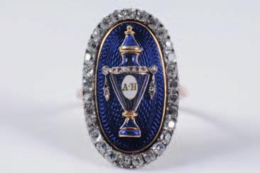 347 347 An 18th century enamelled gold and diamond mounted oval memorial ring, with central vase-shaped urn motif, initialled AH, decorated with rose