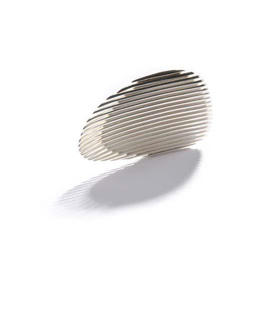 97 A silver Lamellae dress ring, by Zaha Hadid for Georg Jensen The curved silver plaque of tapered linear design, to a shaped hoop, signed Zaha Hadid and Georg Jensen, numbered, UK hallmark, ring