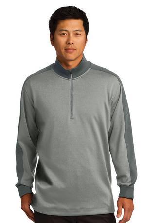 578673-Nike Dri-FIT 1/2-Zip Cover- Up A boldly striped inner collar and reverse coil zipper give this cover-up an edge. Of course, it also performs with Dri-FIT moisture management technology.
