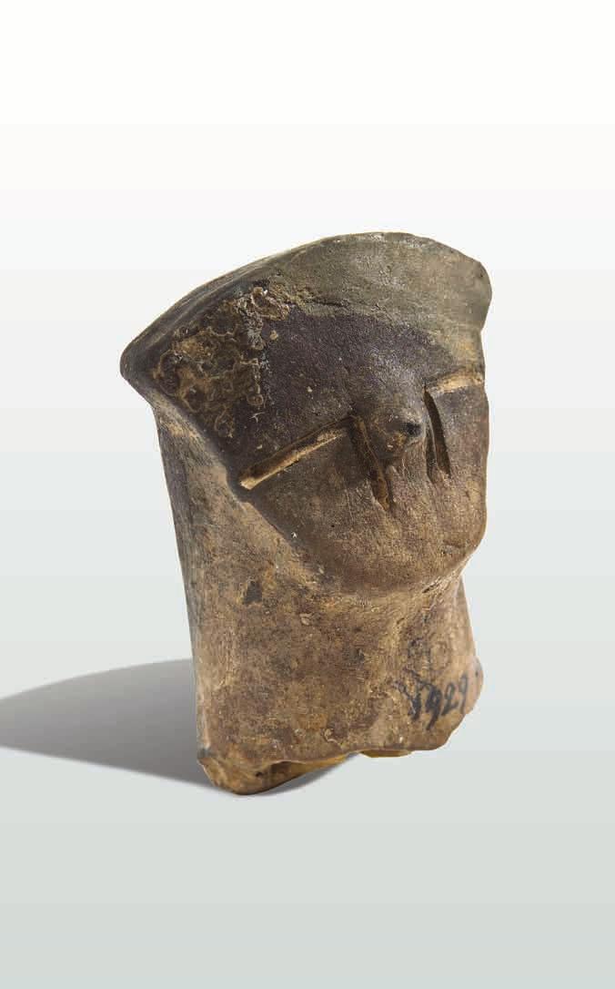 Kipec v obliki človeške podobe Žgana glina; višina 5,5 cm