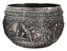 139 139 A Burmese silver bowl stamped to the base Maung Yin Maung, Master Silver Smith 29, Godwin Street, Rangoon, of circular outline decorated in low