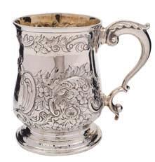163 163 A Victorian glass and silver mounted claret jug, maker Robert Hilliard, Birmingham, 1872 the moon-shaped body with etched floral