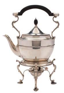 * 200-300 17 17 An Edward VII matched silver three-piece bachelor s tea service, maker Walker & Hall, Sheffield, 1908, and Chester 1906 of barge-shaped outline, with wavy edge border and raised on