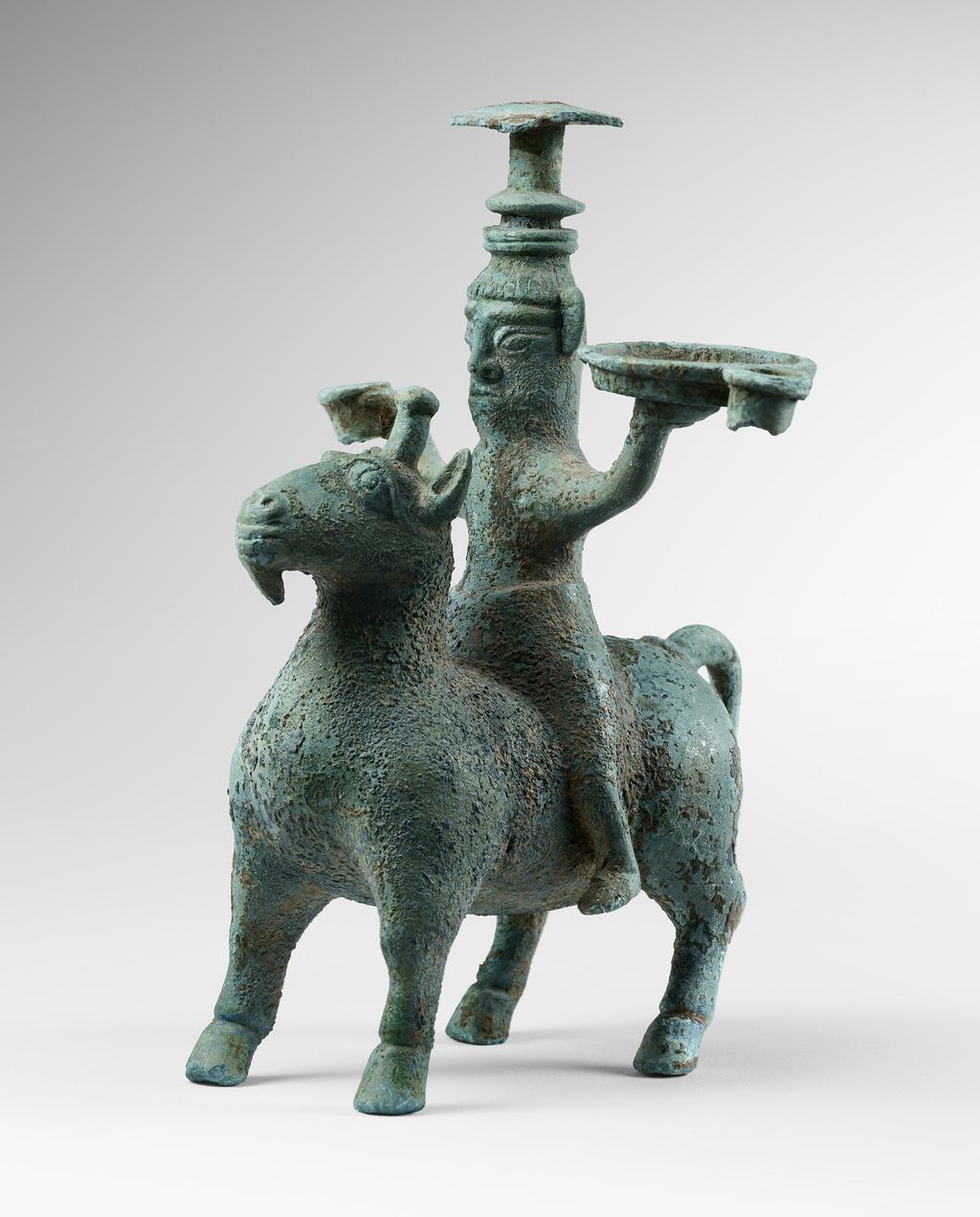 Bronze figure riding a mythical beast Han