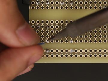 Since the rows are all linked together, we can just solder the pins that are closed to each