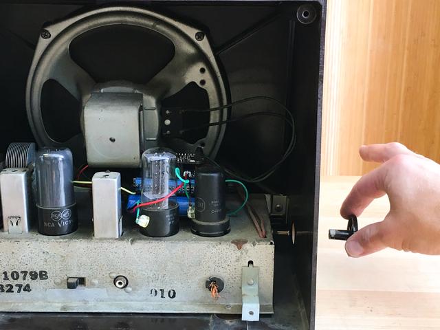 Use the Haunted Radio Reassembly Put your radio back together now, sliding it in place first, and then
