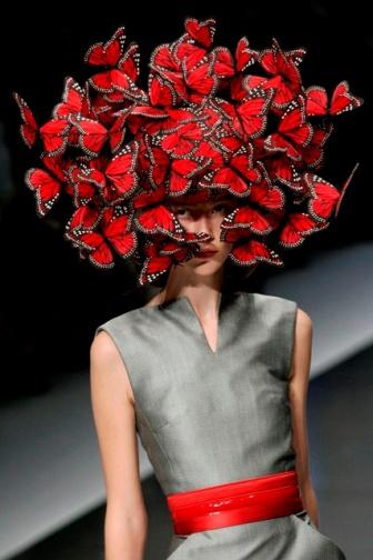 21 PhilipTreacy is an Irish hat designer who has designed hats for famous fashion designers such as Alexander McQueen, Givenchy and Valentino.