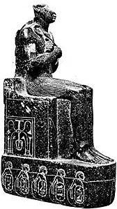 The Pharaoh is wearing a decorated Nemes with Cobra on its front.