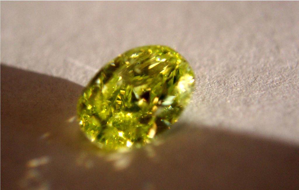 UNIQUE NEON YELLOW GREEN COLORED DIAMONDS A rare 0.