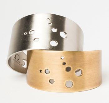ZODIAC CUFF An astrological sliver of the night sky is represented on each