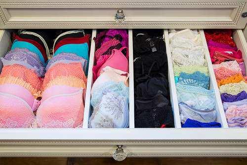 Photo by Interior Sanctuary For the ultimate in organization, turn to a sectioned grid. These individual cubbies are perfectly sized for a single bra, pair of socks, or rolled-up belt.
