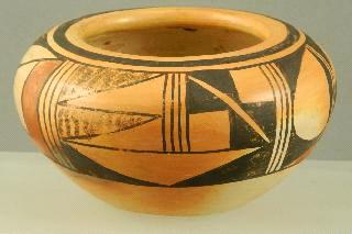 Central American decorated terra- cotta bowl with three handles,