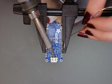 Turn the board over and solder on your JST battery connector