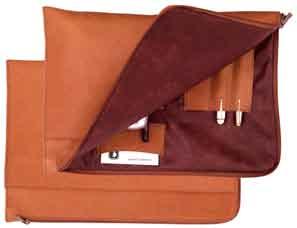 Briefcase This computer briefcase features two exterior zippered pockets (front and back), a