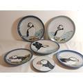 250. 6 Various sized Highland stoneware Scotland Puffin plates the largest being 10" dia 40-60 258. Half of bottle of vintage Lambs Navy Rum 80% proof 251.