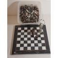 17. Unusual chess set - the pieces being made from nuts and bolts 25.