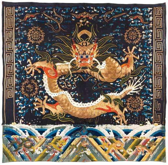 dragon, executed in gilt-wrapped threads, amongst couched blue silk ruyi clouds, gilt-wrapped thread shou, and above couched swirling waves and lishui