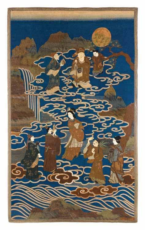 944 944 A Japanese Embroidered Tapestry executed in a knotted stitch and depicting a igural scene with the eight Daoist immortals, each bearing his or her traditional attribute, with gilt wrapped