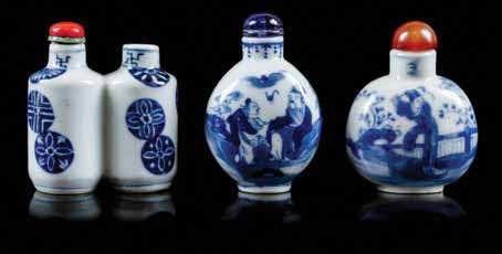 484 Two Famille Rose Porcelain Snuf Bottles the irst of circular form, painted on one side with a circular panel enclosing a scholar with his attendant, surrounded by characters, the second of