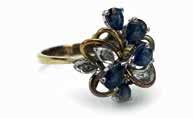 yellow gold ring, overall 5.9 gms (2) 60-100 Lot 831 832 A 14ct yellow gold ring set diamonds and sapphires in a floral spray setting, ring size O, 2.