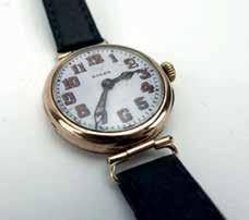 961 A gentleman's early 9ct yellow gold cased wristwatch by Longines, the circular dial with gold coloured baton and Arabic numerals on a later leather strap, dial d. 2.