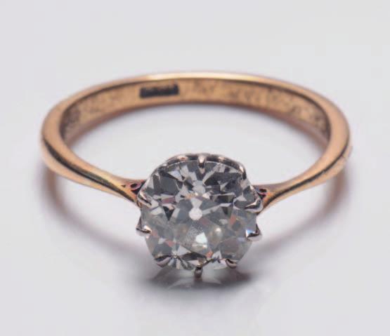 178 178. An 18ct white gold and diamond mounted circular target cluster ring with circular brilliant-cut diamonds estimated to weigh a total of 2.0cts. 700-1000.
