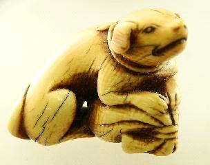 netsuke. 471 Asian carved ivory buckle.
