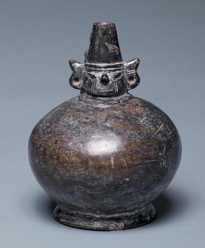 Spouted Vessel with the Head of a Sicán Lord Northern Coast, Lambayeque Late Intermediate Period 900 1100 CE 15.2 x 12.7 x 14.9 cm Collection of Mississippi Museum of Art Gift of Sam Olden 1989.
